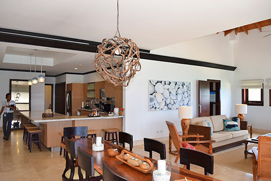 kitchen living and dining in the beachfront suite