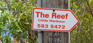 Anguilla restaurant, Karla's At De Reef, road sign