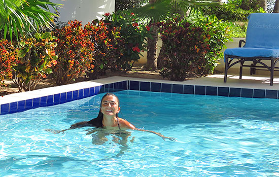 swimming in the plunge pool at private villa suite at cuisinart