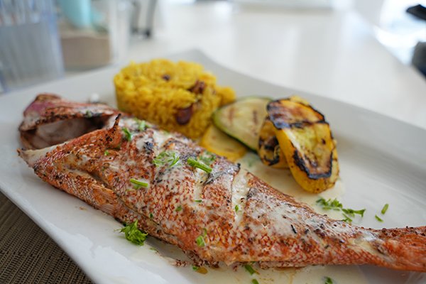 Grilled Whole Snapper at Tasty's Beach Club on Rendezvous Bay